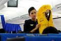 Hai hành khách tự ý xé áo phao trên máy bay Vietnam Airlines