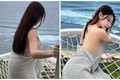 “Quên nội y”, hot girl giữ chặt tấm chăn khi tạo dáng trên biển