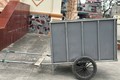 Tên trộm thản nhiên kéo xe rác giữa đường, gặp đúng… chủ xe