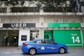 Singapore điều tra thỏa thuận chấn động giữa Uber và Grab