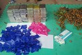 Ngụy trang 59 bánh heroin trong thùng nhãn trên xe khách