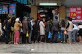 Ảnh: Người Hà Nội xếp hàng dài mua bánh trôi bánh chay