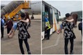 Cô gái đi cao gót được chồng bế lên máy bay, netizen tranh cãi