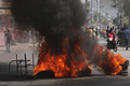 Toàn cảnh thủ đô Haiti chìm trong khói lửa, bạo lực