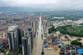 Cảnh ngập lụt nghiêm trọng ở Trung Quốc vì mưa lũ