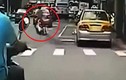 Vợ bị chồng kéo lê sau xe máy trên đường