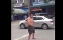 Người đàn ông nhảy Gangnam Style điên cuồng giữa đường