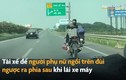 Video: Người phụ nữ ngồi trên đùi tài xế môtô