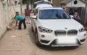 Người đàn ông gây "sốc" khi dùng BMW X1 làm xe chở rác