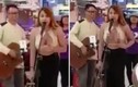 Cô nàng chuyển giới để lộ ngực trần hát trước siêu thị