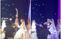 Độc lạ cặp đôi vác “kiếm khổng lồ” cắt bánh cưới như phim 