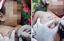 Video em bé bị giữ chặt để xăm hình ở Việt Nam lên báo nước ngoài