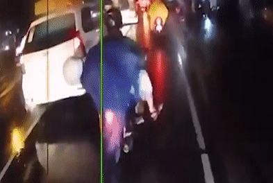 Video: Áo mưa cuốn vào bánh xe máy, quật ngã người phụ nữ xuống đường