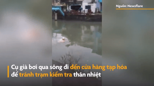 Video: Cụ già bơi qua sông để tránh trạm kiểm tra chống dịch Covid-19
