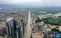 Cảnh ngập lụt nghiêm trọng ở Trung Quốc vì mưa lũ