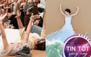 Ấm lòng khoảnh khắc cô dâu xe lăn "đứng" giữa vòng tay của hàng trăm du khách