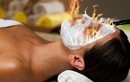 Cận cảnh đốt lửa massage mặt làm đẹp 