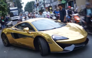 Siêu xe McLaren 570S chật vật vào showroom Sài Gòn