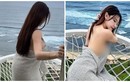 “Quên nội y”, hot girl giữ chặt tấm chăn khi tạo dáng trên biển