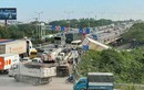 Xe container lật trên cầu Thanh Trì, giao thông ùn tắc kéo dài