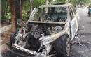 Ô tô BMW bất ngờ bốc cháy trơ khung trên phố Hà Nội