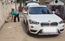 Người đàn ông gây "sốc" khi dùng BMW X1 làm xe chở rác