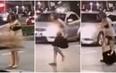 Người phụ nữ lột đồ giữa đường khi cãi nhau với tài xế taxi 