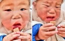Bé trai Trung Quốc khóc nức nở vì tấm che mặt chống Covid-19