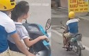 Video: Bố để bé gái lái xe máy phóng như bay trên đường