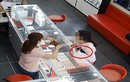 Nữ quái trộm iPhone "dễ như bỡn" ngay trước mặt nhân viên bán hàng