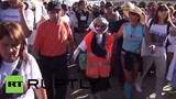 Thán phục cụ bà 91 tuổi đi bộ 1.200km về đất thánh