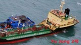 Nhật Bản phát hiện tàu Triều Tiên 'dính' vào tàu 'lạ' trên biển
