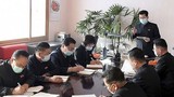 Quan chức Triều Tiên đeo khẩu trang khi họp phòng, chống dịch virus corona