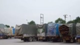Đoàn 21 xe gỗ quá tải từ Lào vào Việt Nam