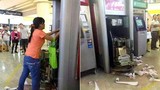 Quý cô đập phá máy ATM vì bị nuốt thẻ gây sốc