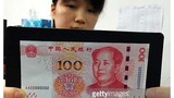 Cận cảnh đồng 100 NDT mới của Trung Quốc