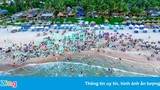 Hàng nghìn người tắm biển giải nhiệt giữa nắng nóng gay gắt