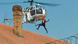 Video: Vợ lái trực thăng giúp chồng vượt ngục