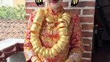 Cô dâu Trung Quốc đeo vàng đầy người trong đám cưới gây xôn xao