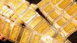 Giá vàng hôm nay: Vàng SJC giữ giá, vàng thế giới lao dốc