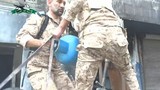 Phe nổi dậy Syria bắn bình gas vào quân chính phủ