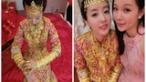 Câu dâu xinh đẹp mặc “áo giáp vàng” trong ngày cưới