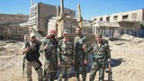 Ảnh quân đội Syria đánh trả phiến quân ở quận Al-Qaboun 