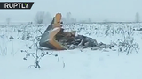 Những hình ảnh đầu tiên về hiện trường máy bay rơi ở Nga