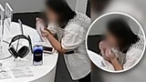 Cô gái trộm điện thoại iPhone 14 bằng cách cắn đứt dây chống trộm