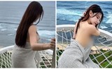 “Quên nội y”, hot girl giữ chặt tấm chăn khi tạo dáng trên biển