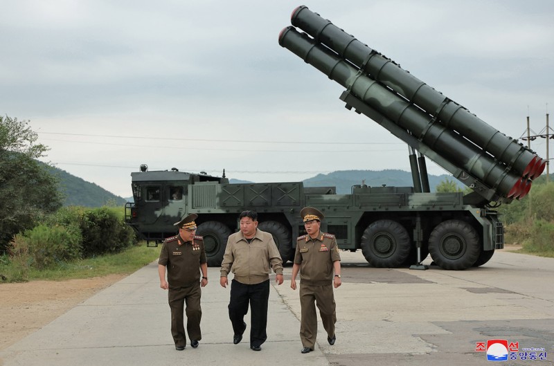 North Korean leader Kim Jong Un guides a military demonstration involving tank units