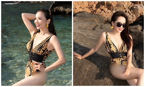 View - 	Người đẹp Tây Đô Hoài An khoe dáng nuột với bikini trên bờ biển