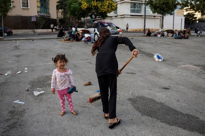 Displaced families shelter amid ongoing conflict, in Beirut