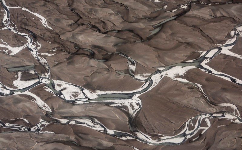 Melting water and glacier mud are pictured in the North of Kangerlussuaq